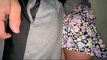 Big-assed girl in a skirt strokes a stranger's penis.