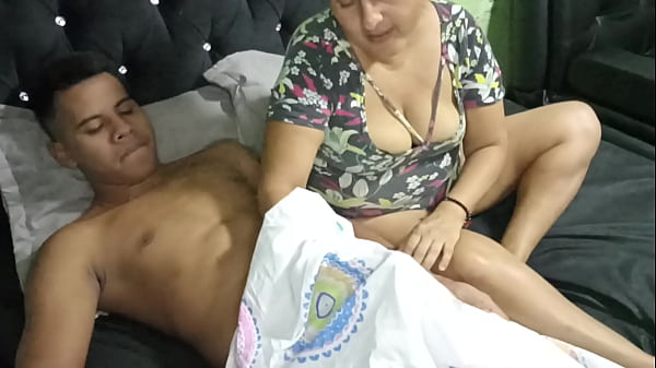I watch movies with my stepson and I suck his rich cock