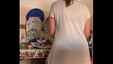 Spying on her in pajamas while she cooks in a thong and lingerie
