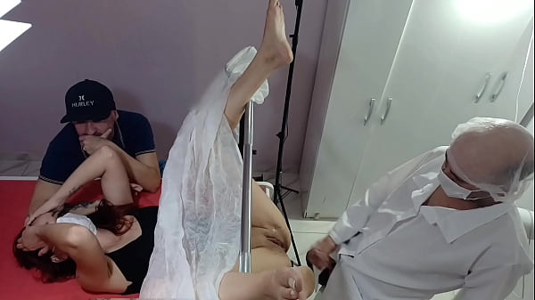 Husband, wife for exam and doctor is excited