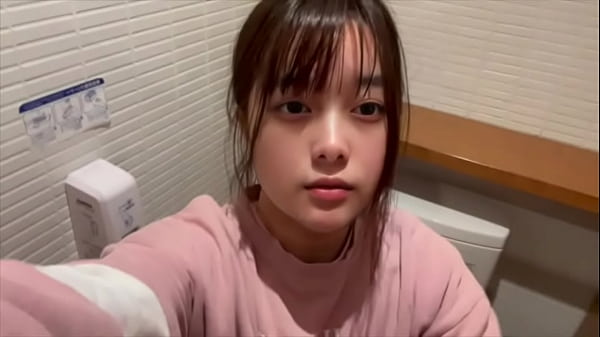 Today, a girl gets excited masturbating even though there is someone peeing next to her, knowing that she shouldn't be doing it.