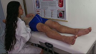 Brunette nurse observing patient's erection.